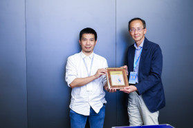 Exchange of souvenirs between Professor William K.M. Lee, Director, and Mr Weihua Tan, Vice President of XPeng Motors