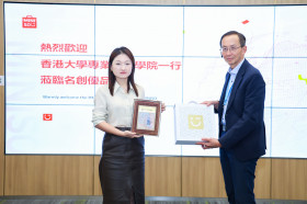 Exchange of souvenirs between Professor William K.M. Lee, Director, and Ms Yujun Tu, Vice Chairman of Miniso Group