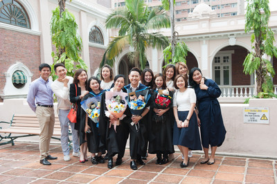 A photo of graduates and their friends